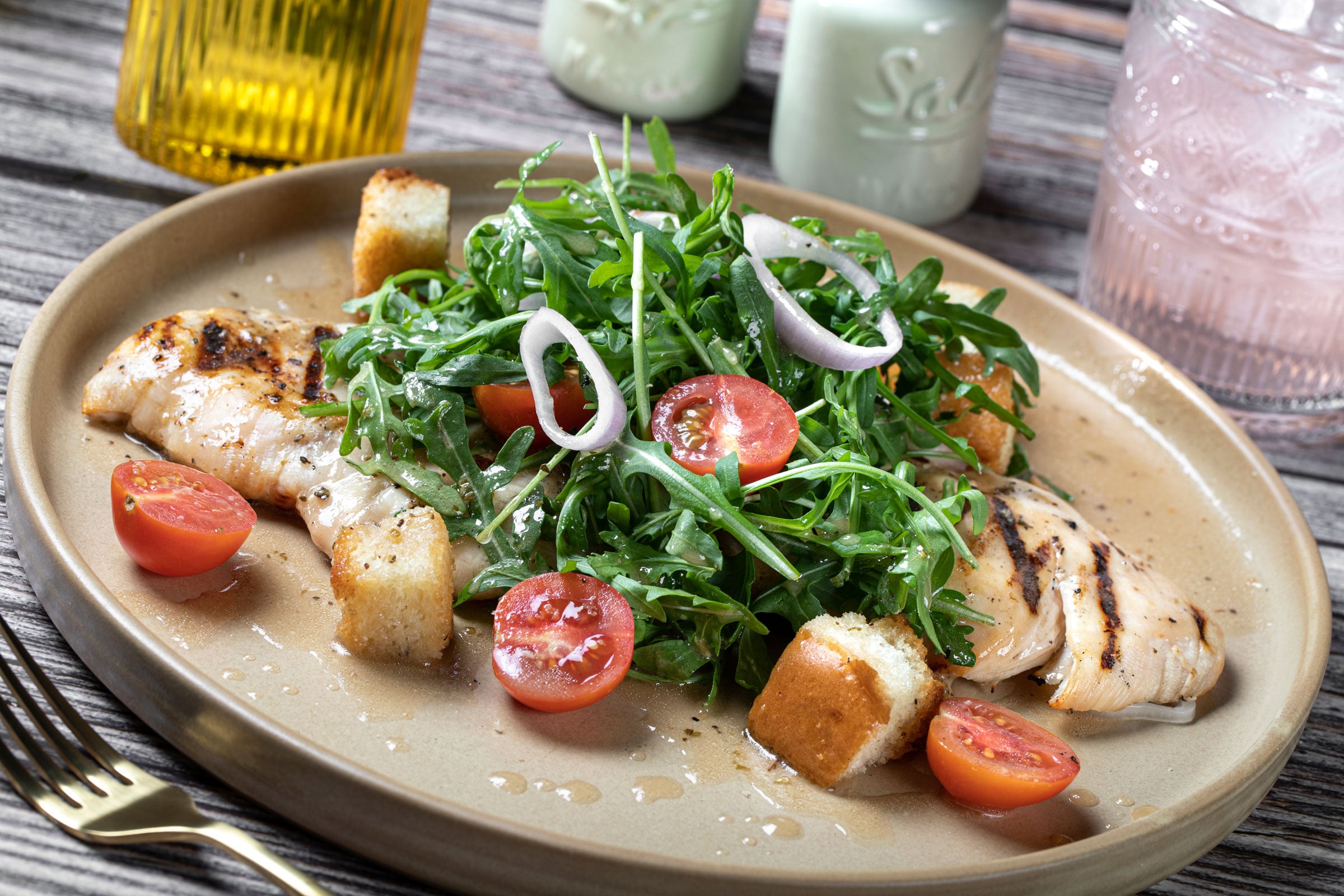 Chicken Paillard Salad at Early Birds restaurant on Blue Diamond Road in Enterprise, Las Vegas – grilled chicken breast with arugula, cherry tomatoes, croutons, and red wine vinaigrette.