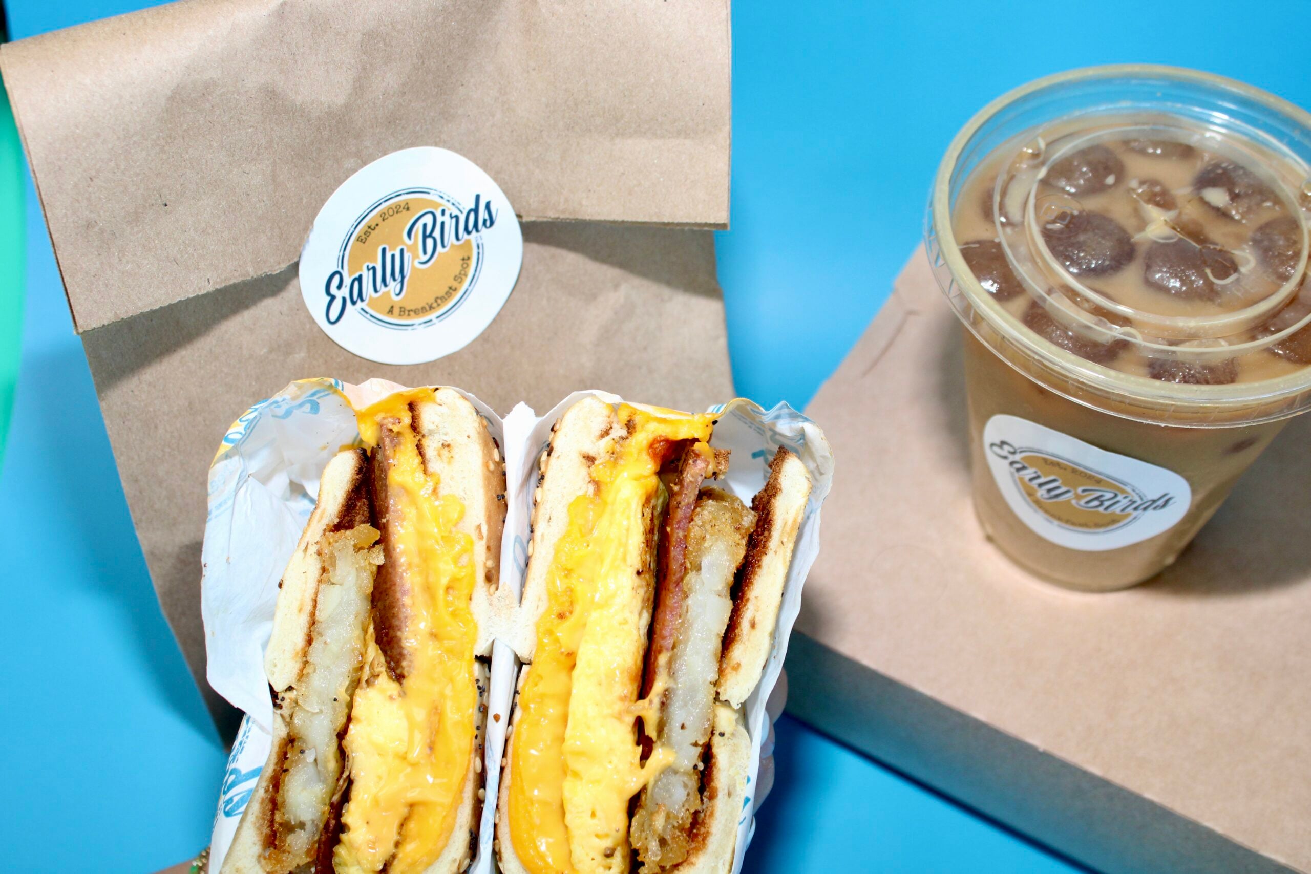 Bodega Bagel Sandwich in Las Vegas with iced coffee from Early Birds breakfast spot