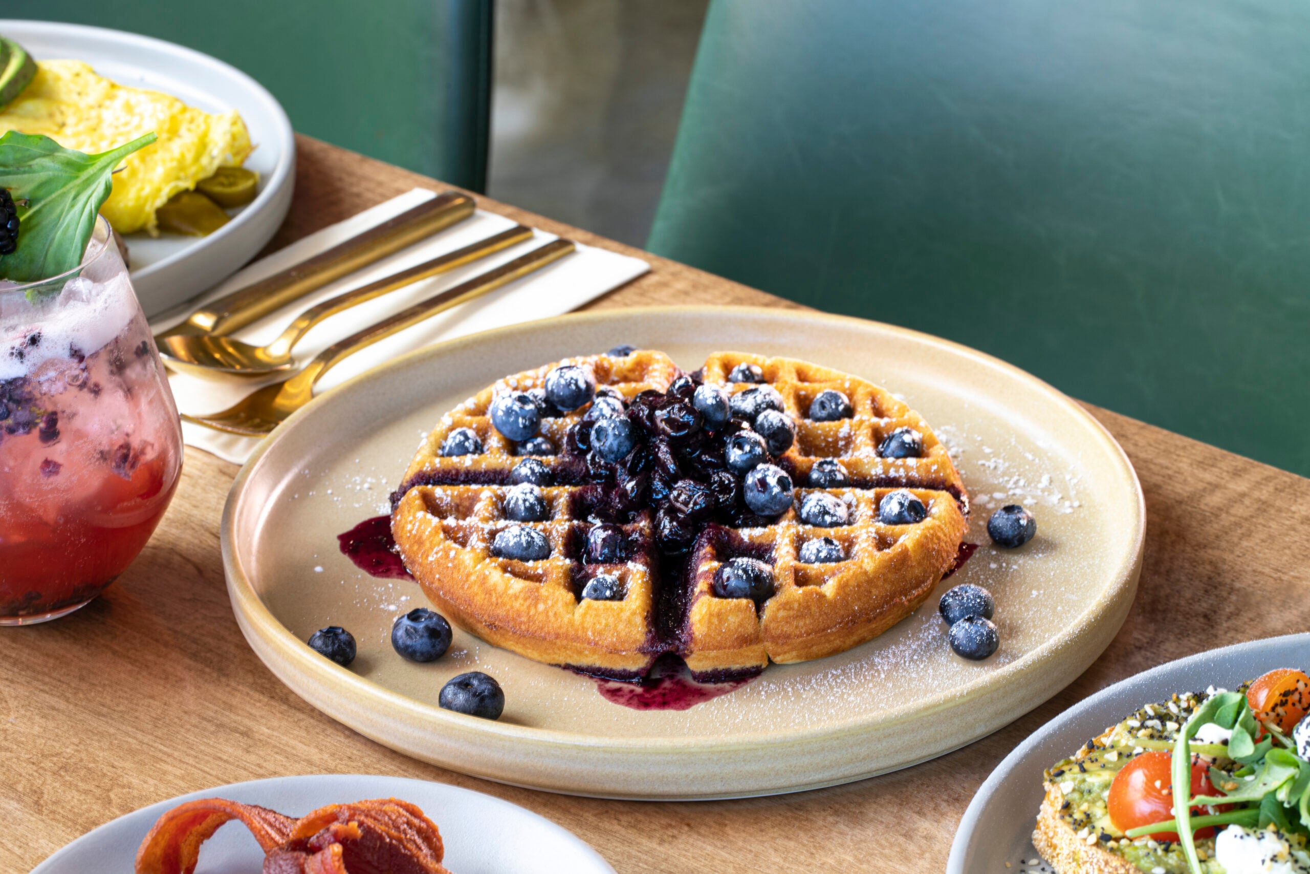 Belgium waffle topped with blueberries served at Early Birds, the best Belgian waffle breakfast in Las Vegas