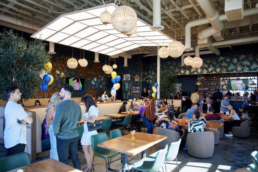 Guests enjoying breakfast inside Early Birds restaurant, home of the best Belgian waffle breakfast in Las Vegas.